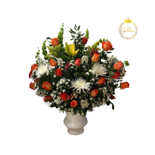 Elegant flower arrangement with orange roses and yellow lilies