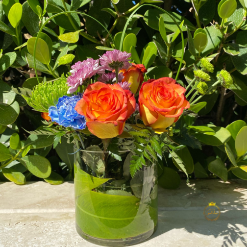 Vibrant Flower Arrangement in Crystal Vase