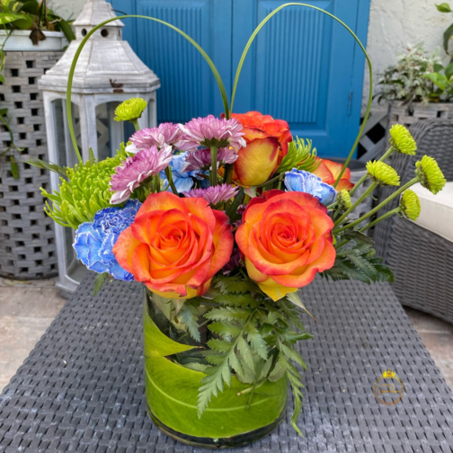 Vibrant Flower Arrangement in Crystal Vase